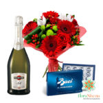 Red gerberas, red roses, sparkling wine and chocolates