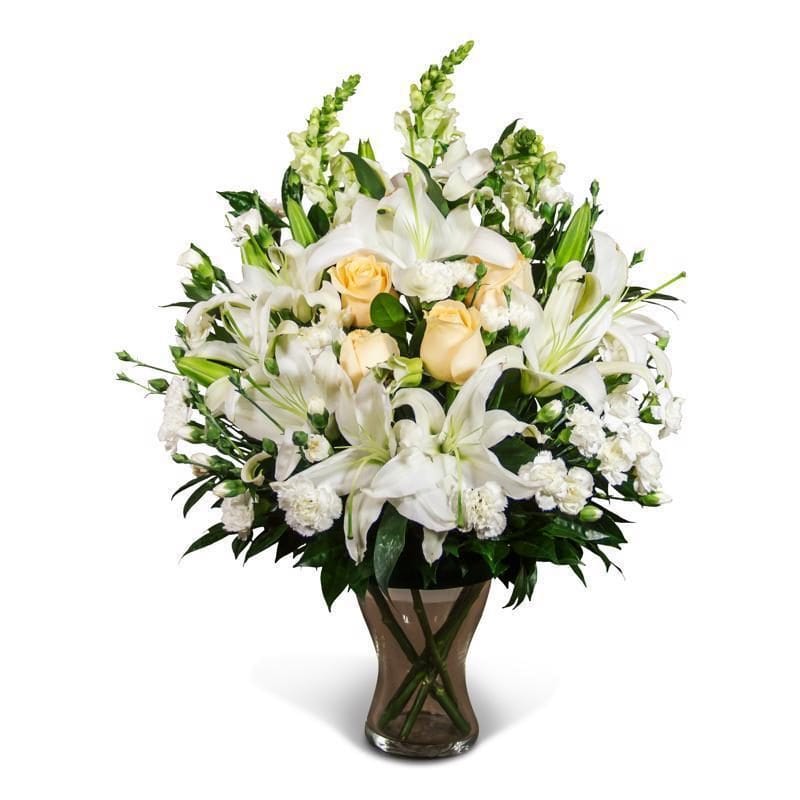 Mazzo bianco per funerale, con lilium bianco e rose bianche