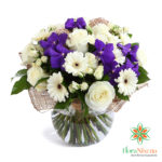 Mazzo di gerbere iris-blu e rose bianche